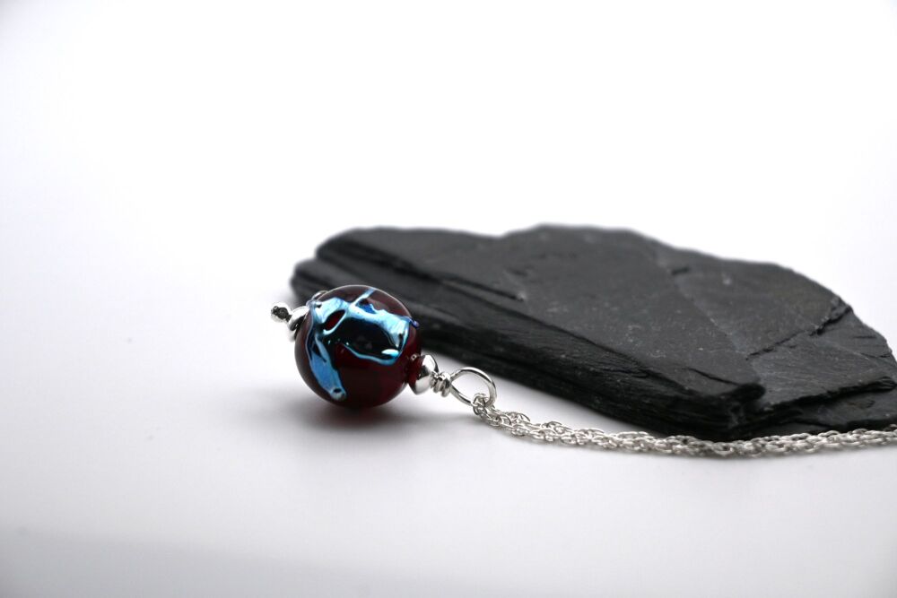 red sphere silver shards