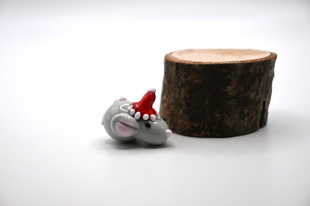 grey mouse with christmas hat