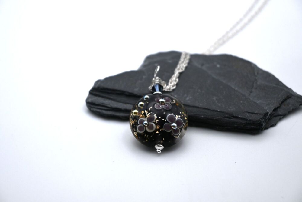 purple and gold glitter flower pendant