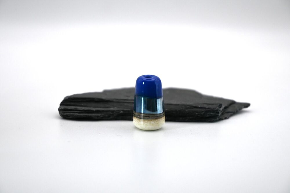 ivory, silver and blue cone