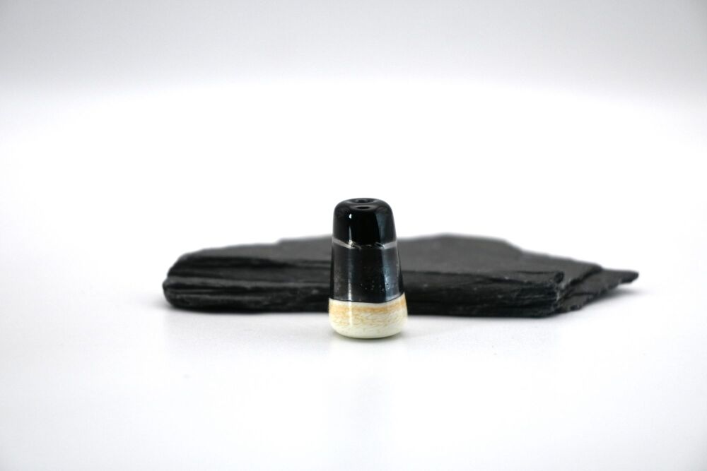 ivory, silver and black cone