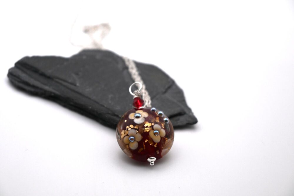 red and gold glitter flower pendant