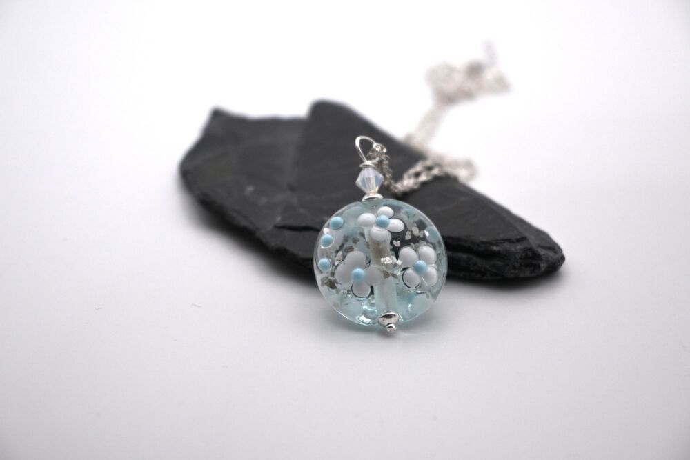 pale blue and silver glitter flower pendant