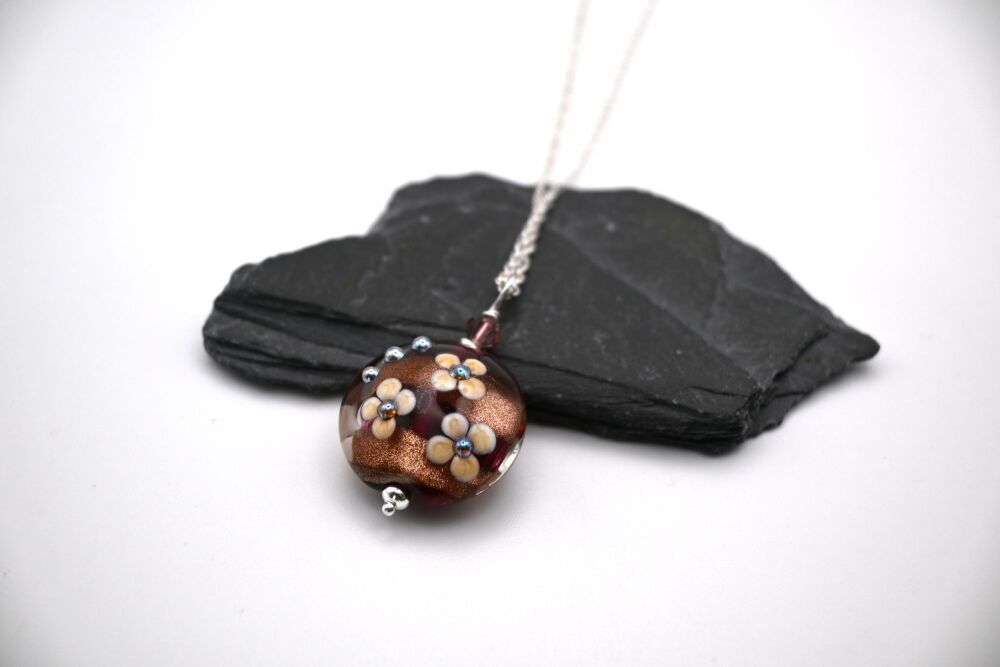 cranberry and goldstone flowers