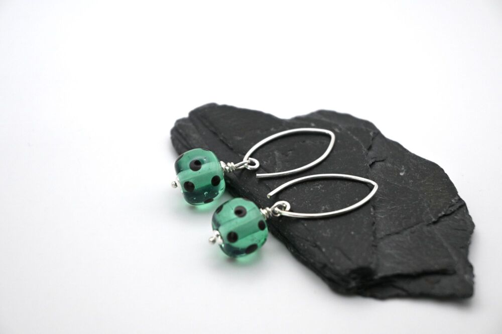 green and black dots