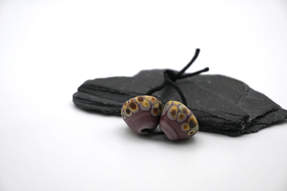 purple raku cones tumbled