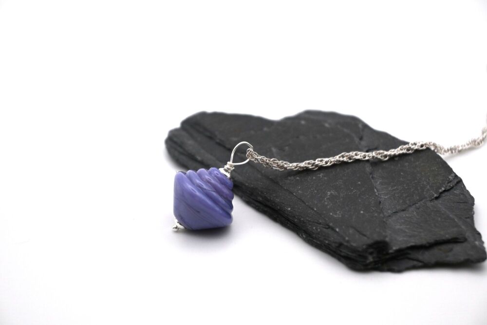 purple spinning top