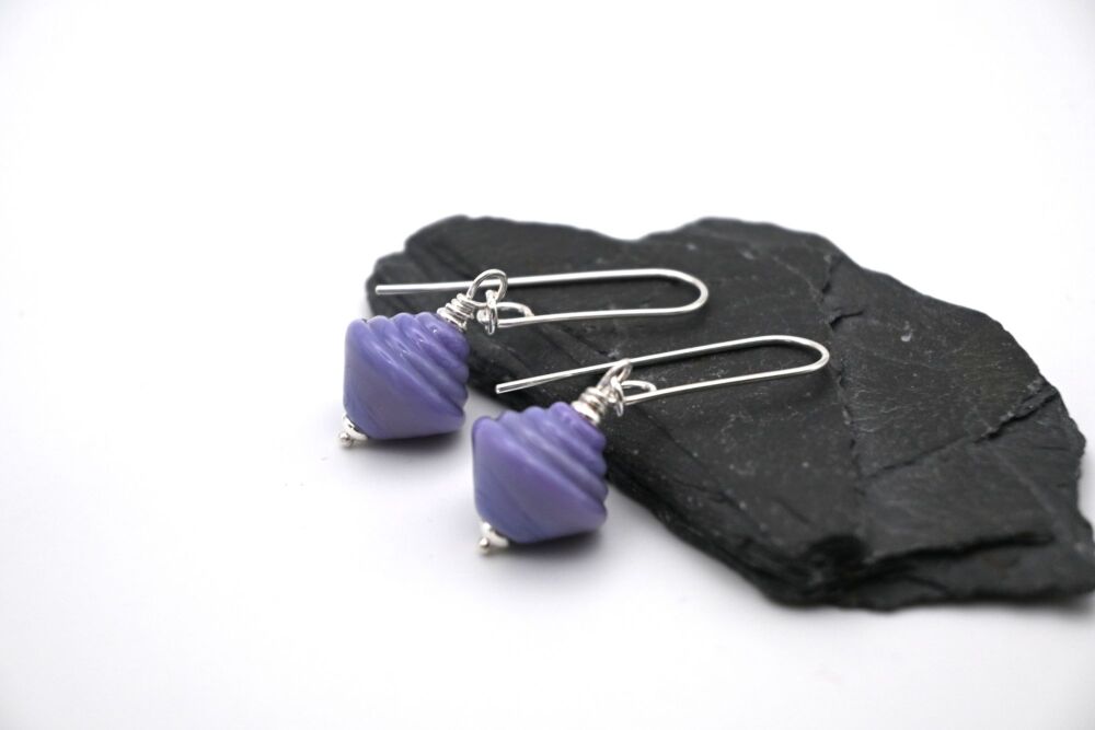 purple spinning top drops