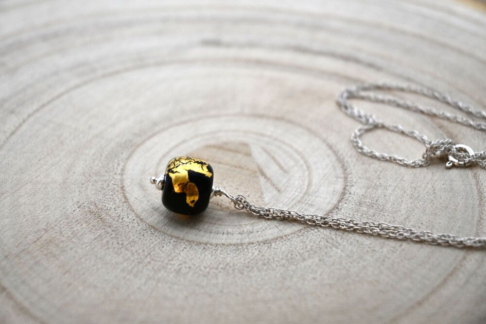 black and gold leaf