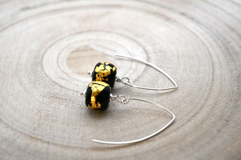 black and gold leaf drops
