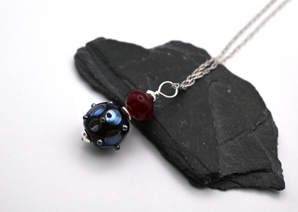 dark red and silver spots