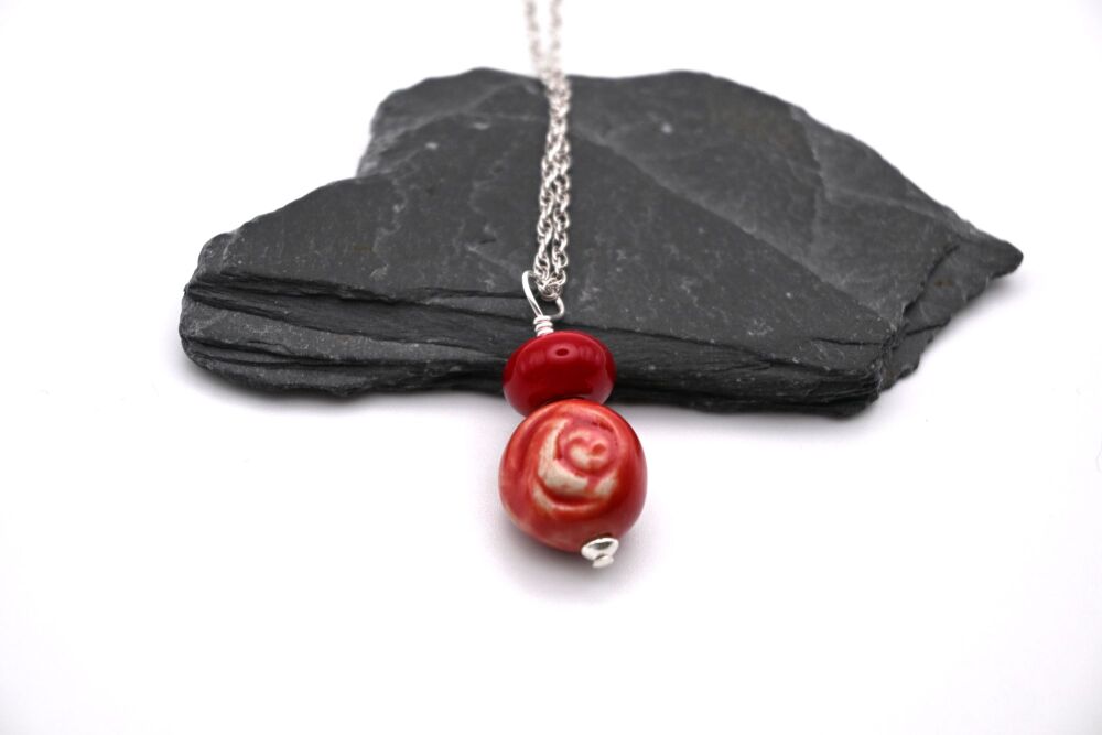 red ceramic rose