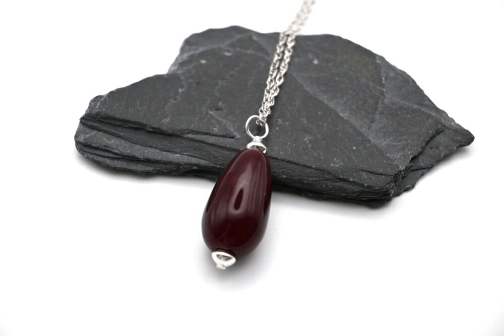 dark red teardrop