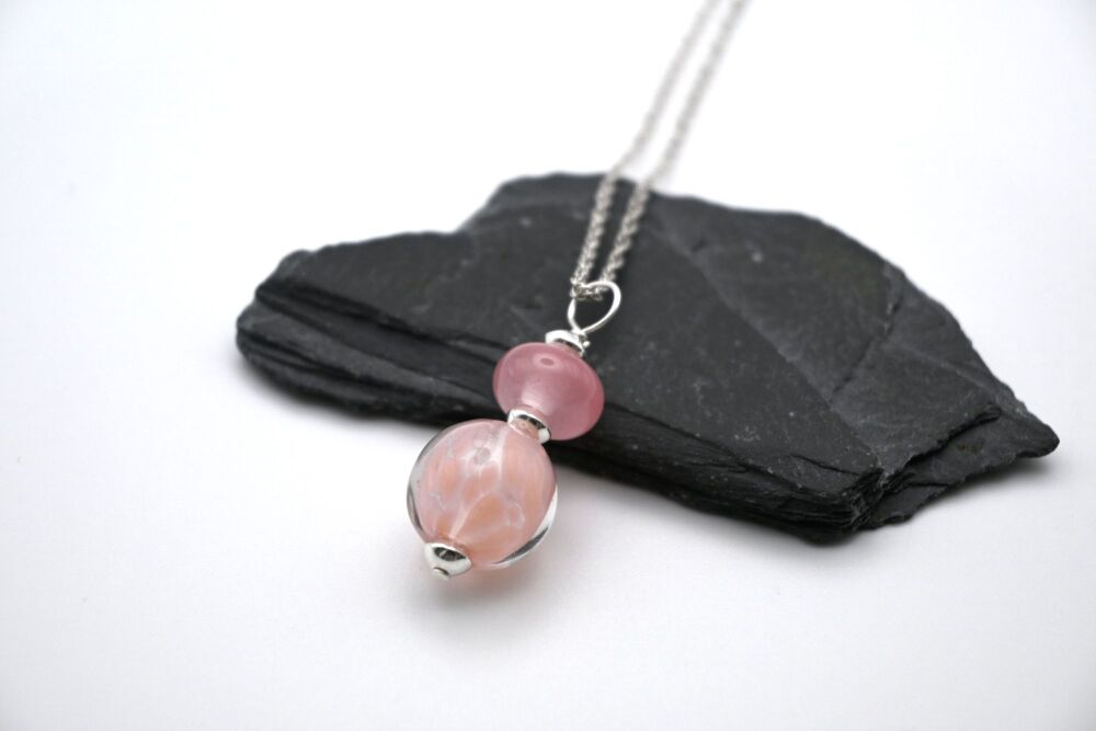 pink speckled sphere