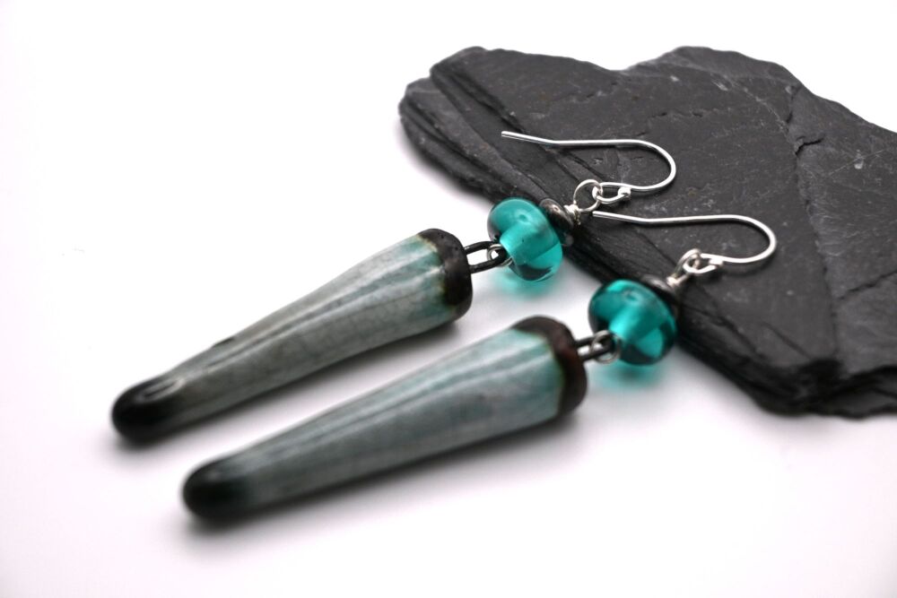 Teal ceramic spikes