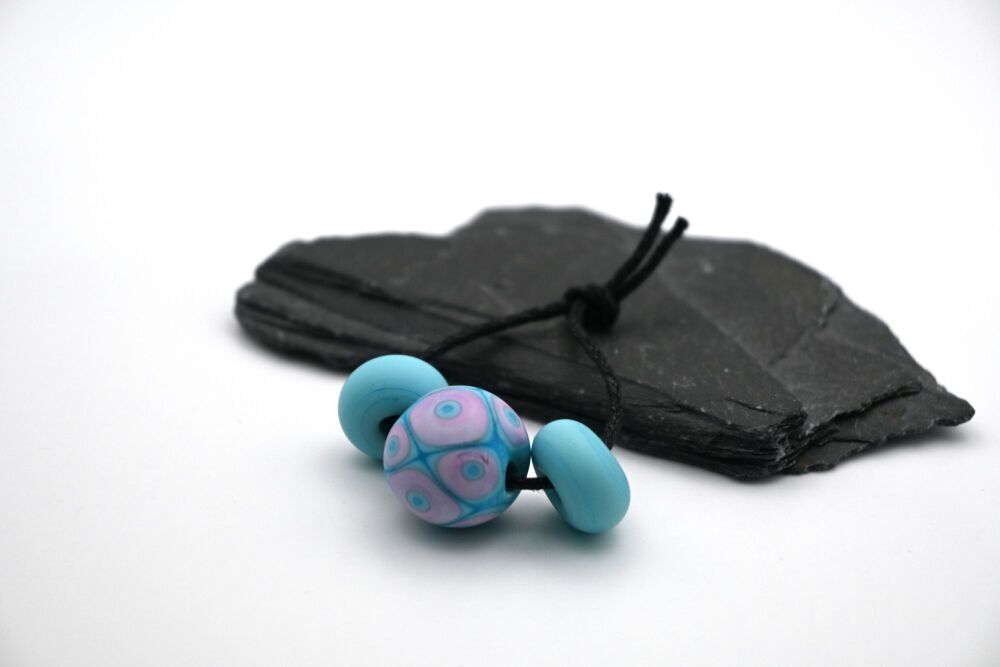 turquoise and lilac spots