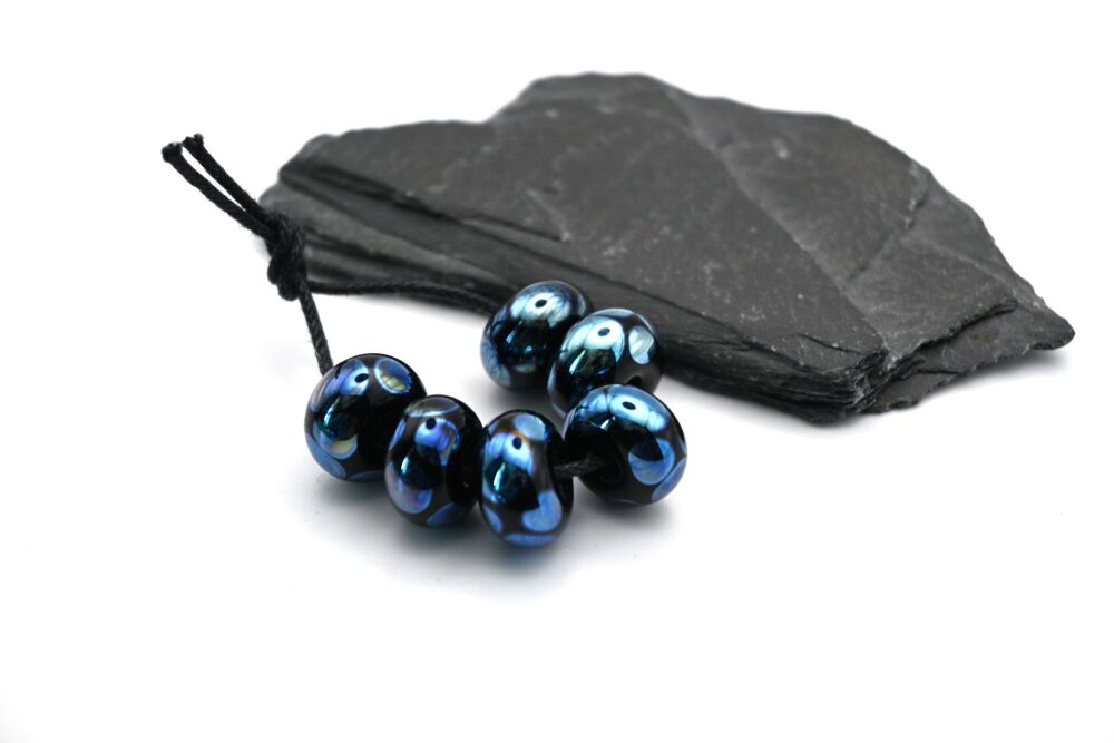 black and silver spots