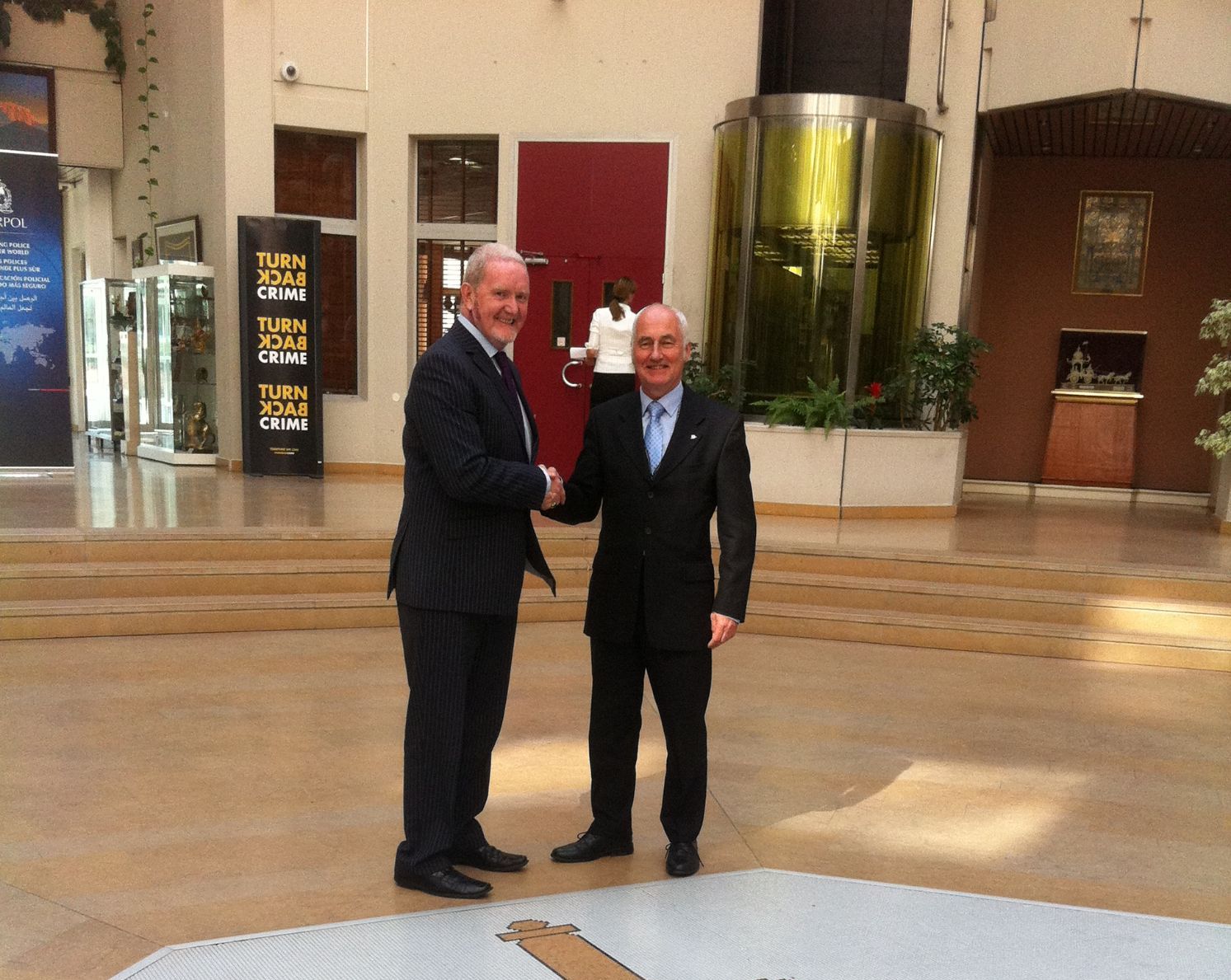 Colum Price and Alan King preparing for a visit by the Brunei Delegation at Interpol