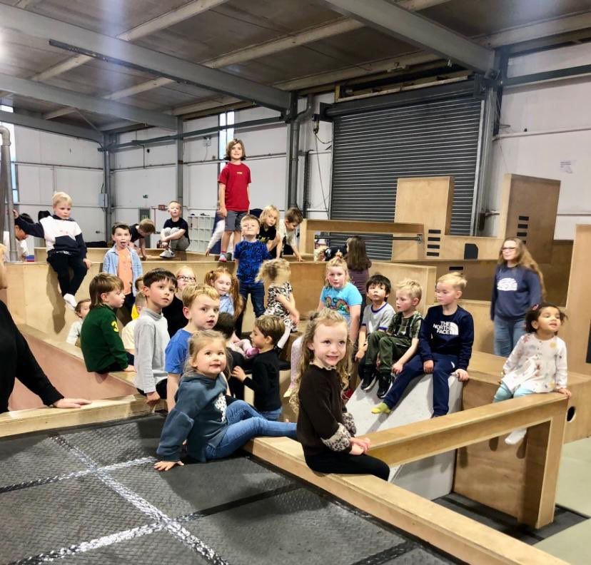 Children playing on play eqipment at a party