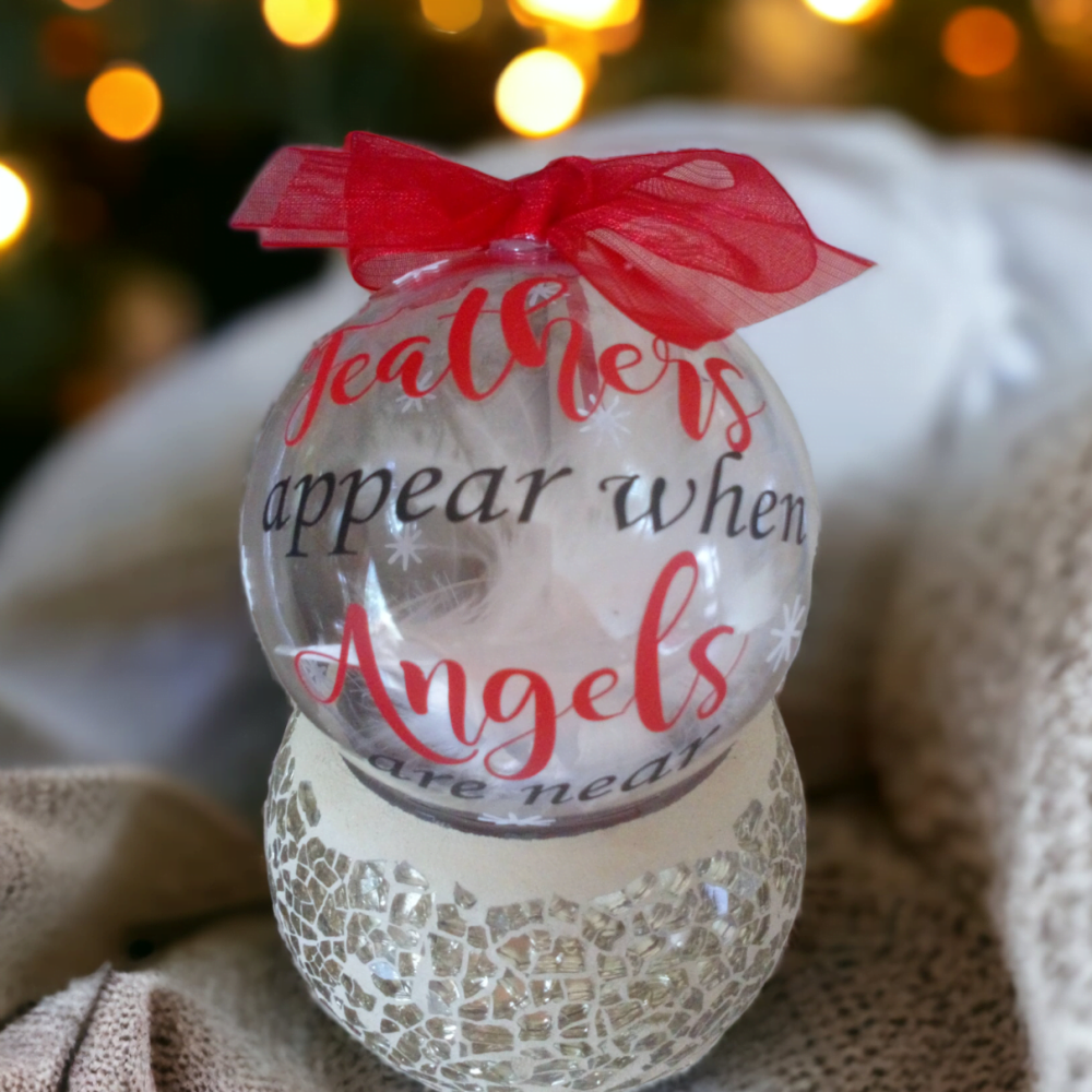 Personalised Festive Tree 'Angels Are Near' Clear Bauble With Feathers