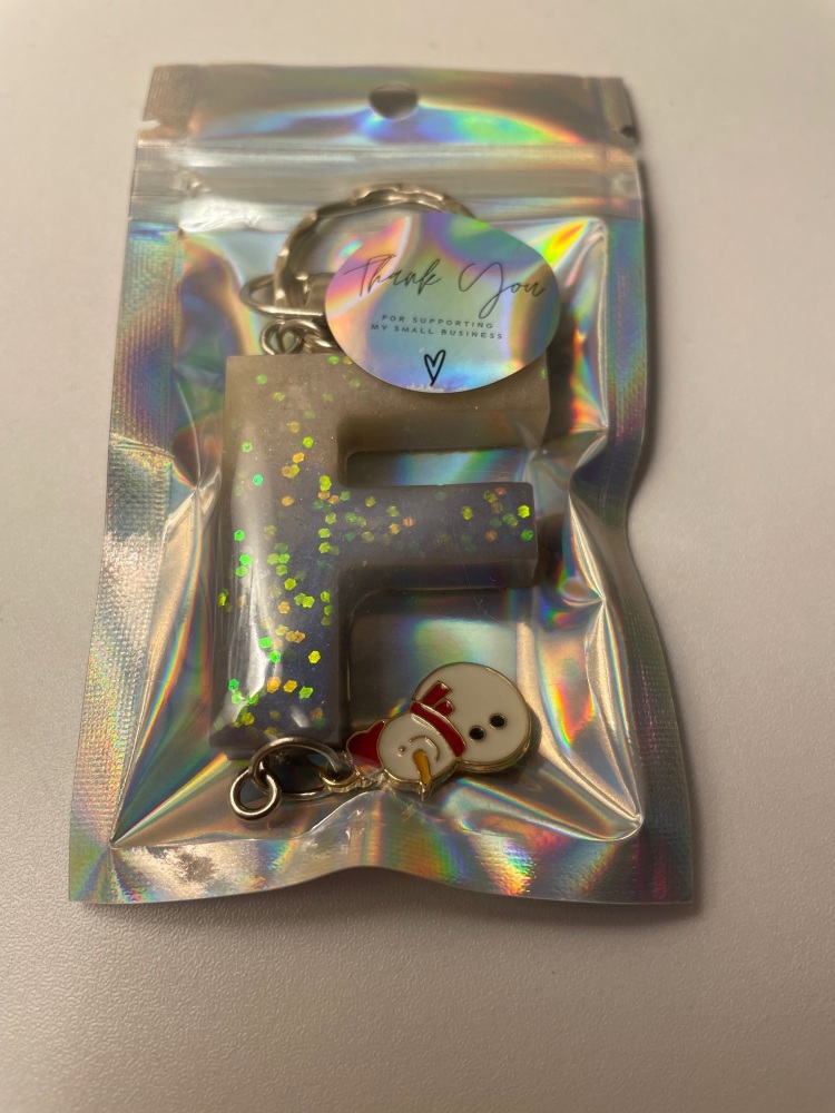 Letter ‘F’ with snowman charm (removable)