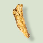 Dried angelica root pieces, an earthy botanical used to bind the flavors of the Frigiliana-distilled gin