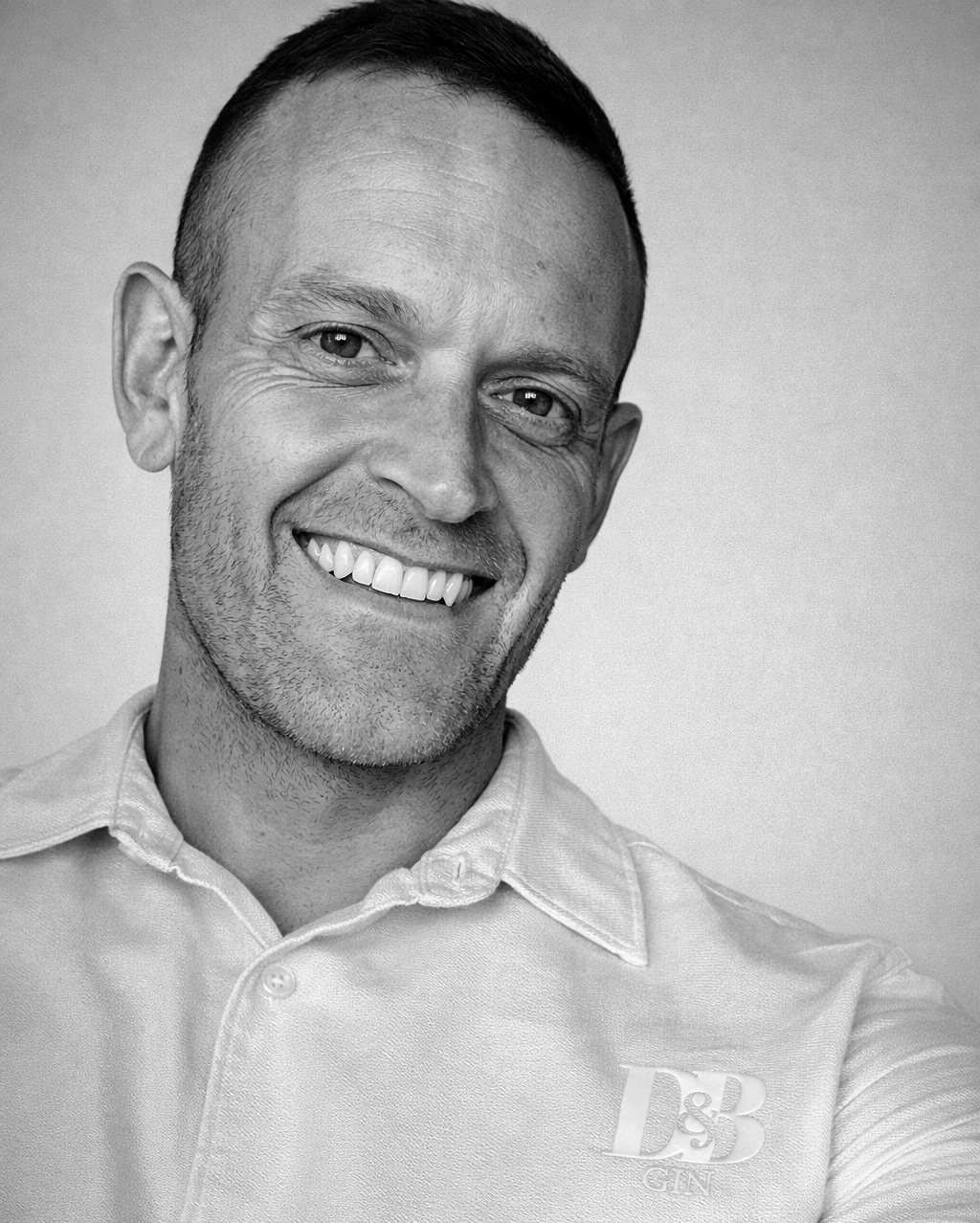 Chris and Rachel, the founders of Davison & Brogan, standing in the heart of Frigiliana, Spain, sharing their mission to create a lasting legacy for the village.