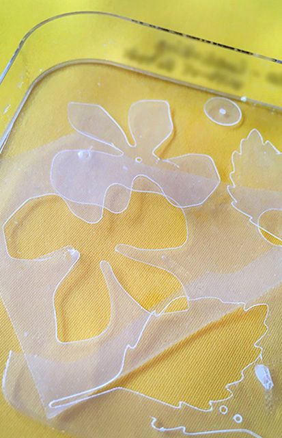 Translucent flower shaped sequin cut from biobased biodegradable sequin film