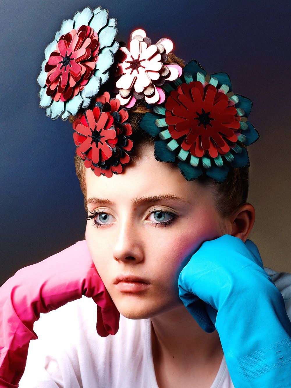 Model wearing a headband of flowers made from bespoke cut layers of sequin film