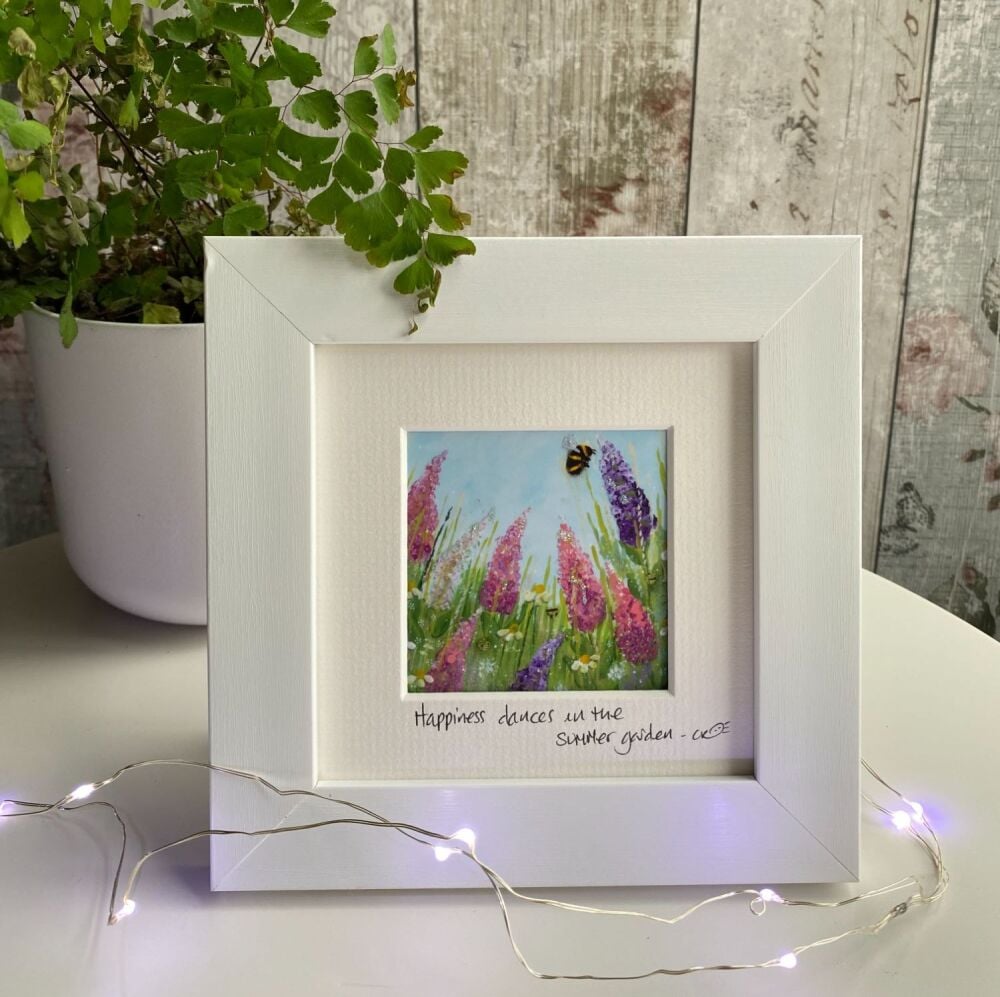 Happiness dances in the summer garden Mini Framed Print