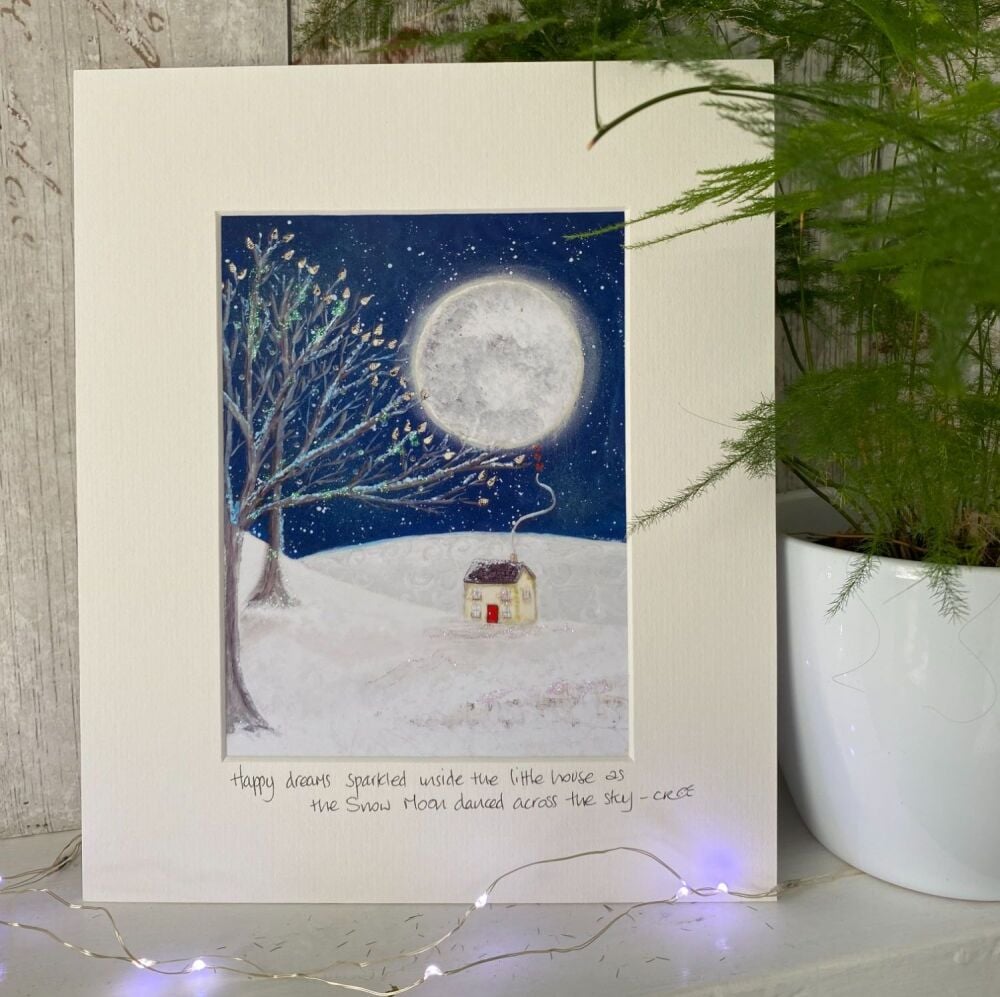 Happy dreams sparkle inside the little house as the snow moon dances across the sky - Mounted print