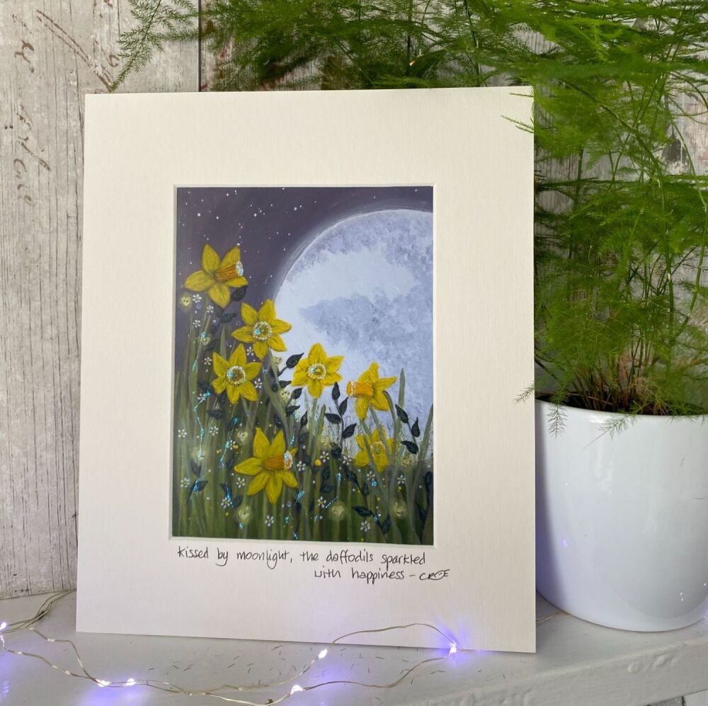 Kissed by moonlight the daffodils sparkled with happiness - Mounted print