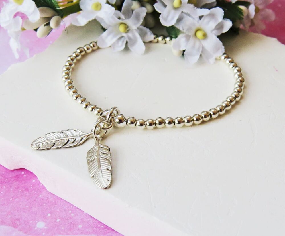 Double Feather Charm Bracelet