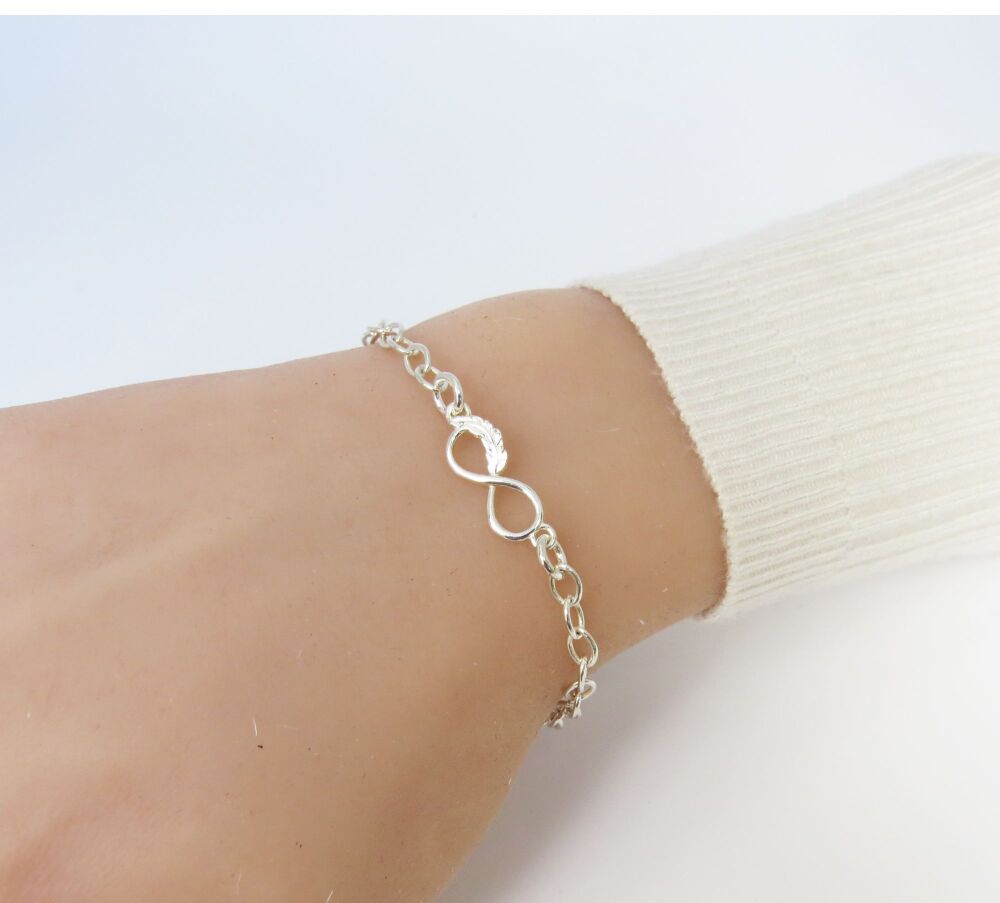 feather charm bracelet