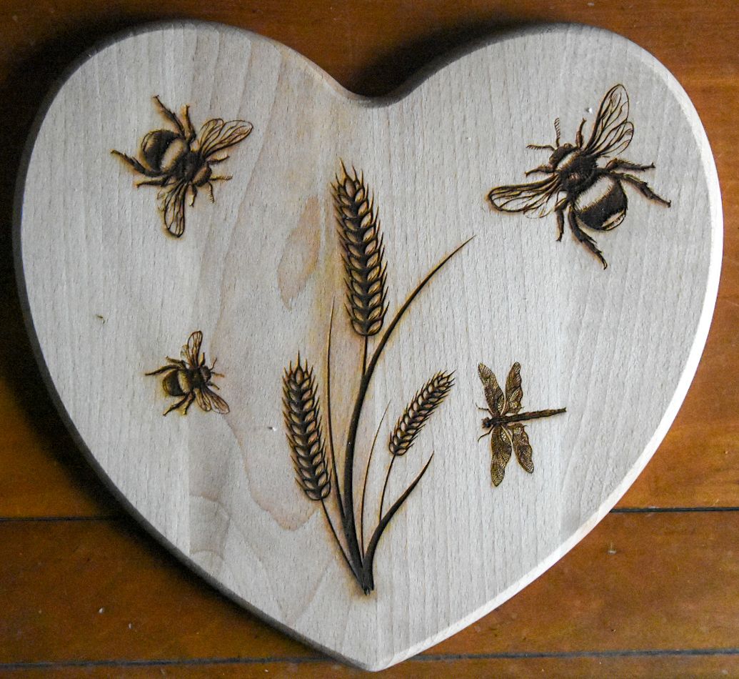 Heart chopping board with bee design