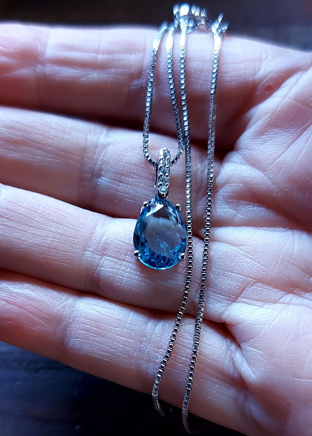 Silver and blue topaz necklace