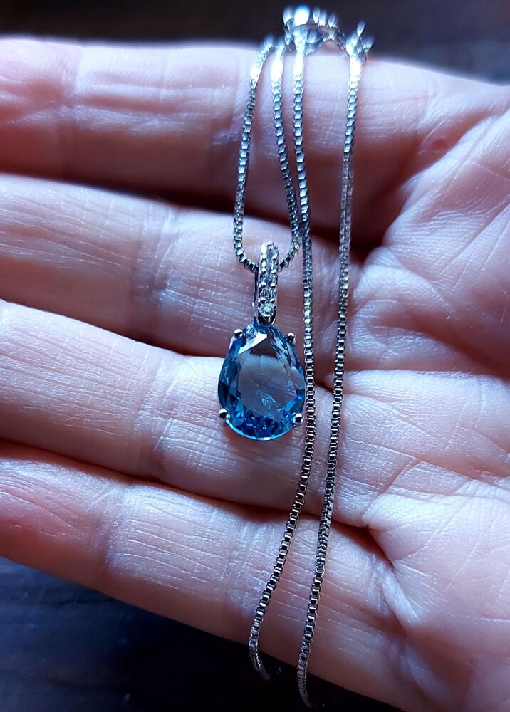 Silver and blue topaz necklace