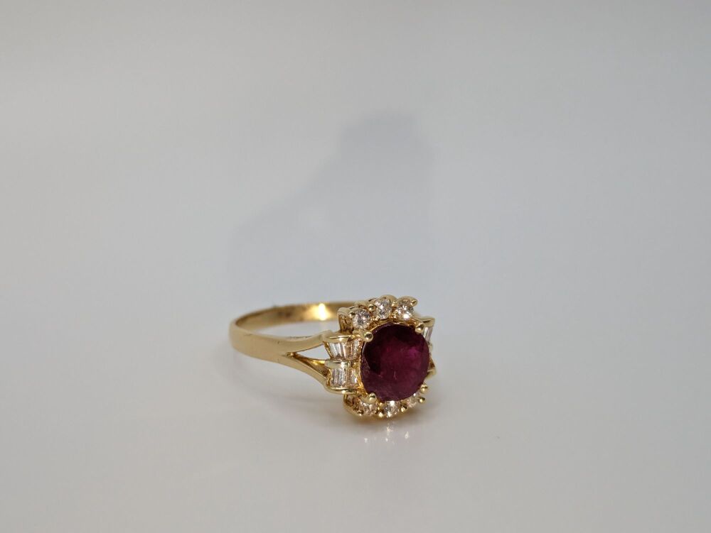 Ruby and diamond halo Ring in 18K Yellow Gold