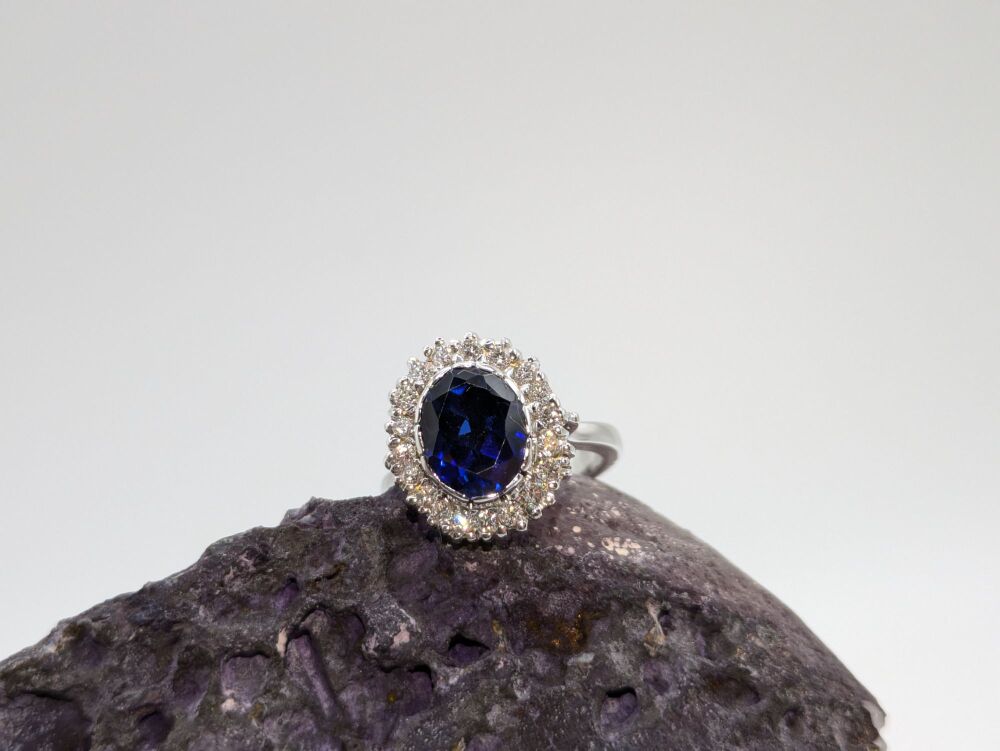 Sapphire and Diamond halo Ring in Platinum 5.02ct Total VS1/ D
