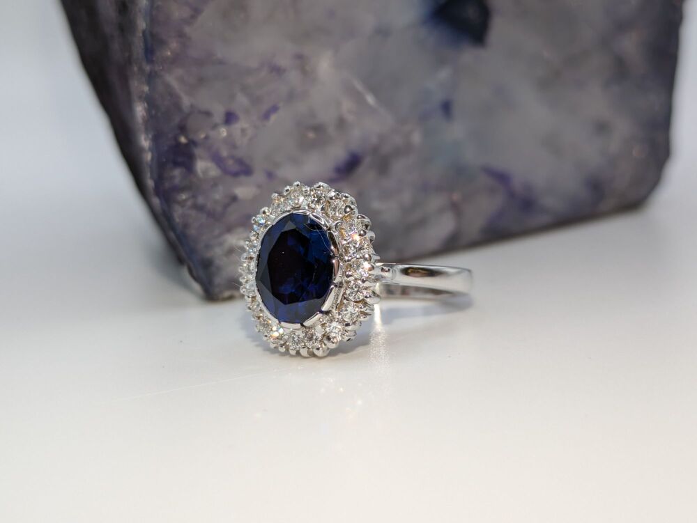 Sapphire and Diamond halo Ring in Platinum 5.02ct Total VS1/ D
