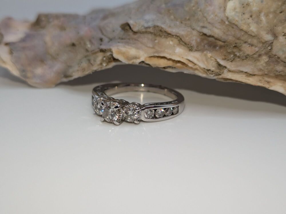 Channel Shoulder set Trilogy ring with diamond accents 1.20ct VS1/E