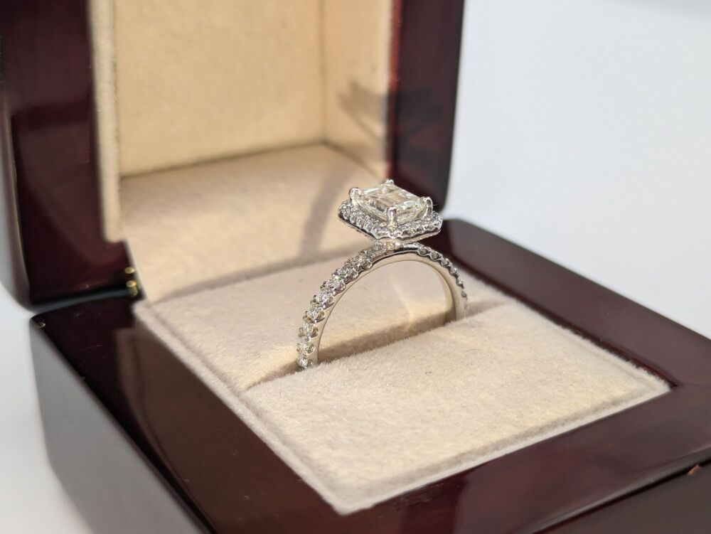 Emerald cut with diamond halo & shoulders 1.02ct in Platinum VS1/ F