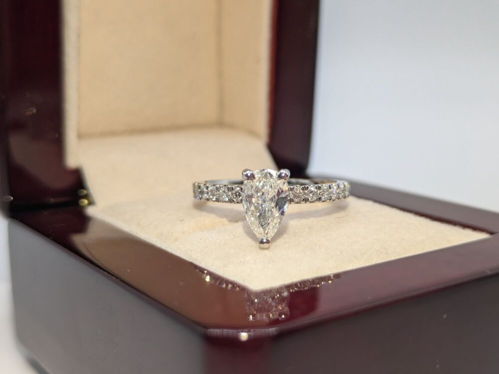 Hidden Halo Pear shoulder set ring in Platinum 1.23ct VS1/ F