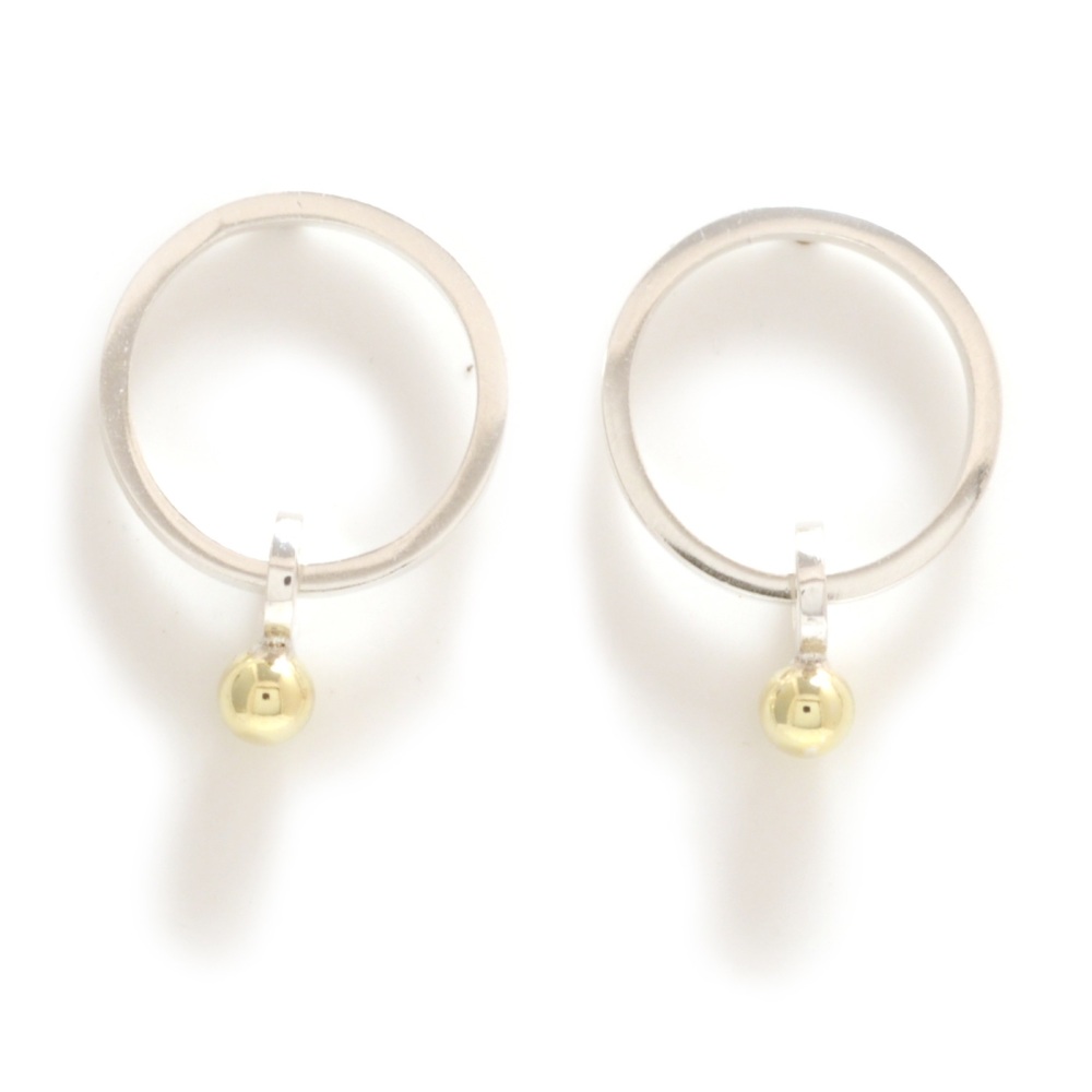 Silver circle stud earrings with dangling gold ball