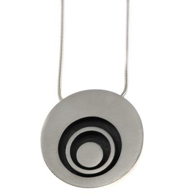 Large pod with oxidised interior and silver concentric circles detail