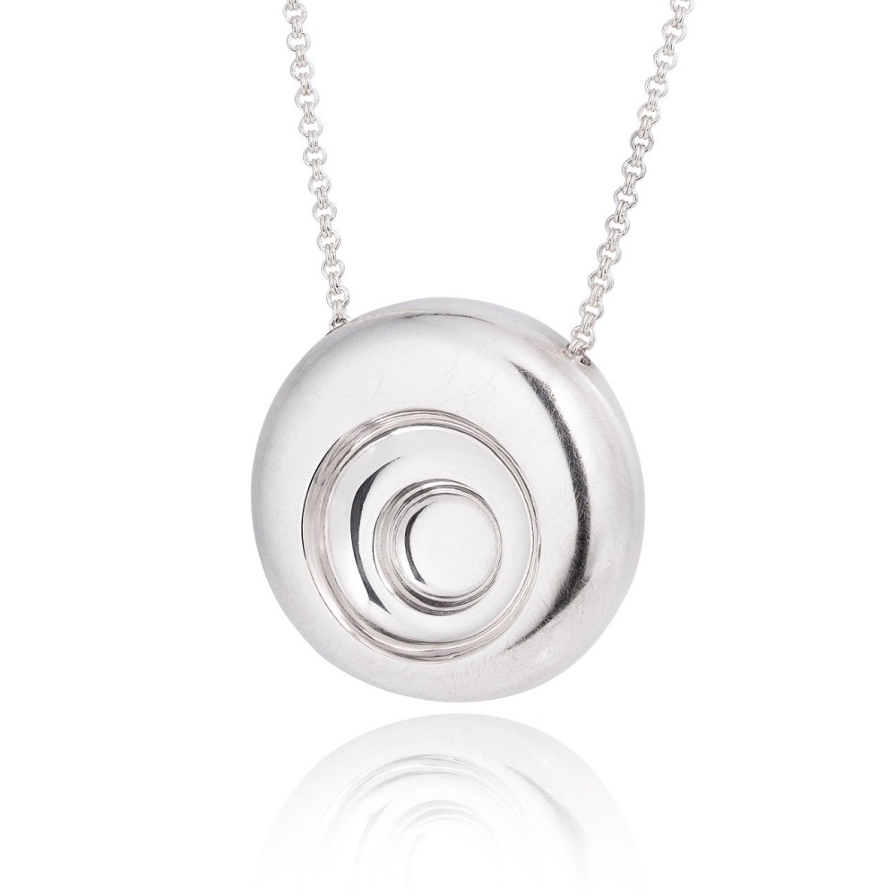 Silver round radius pendant with double concave feature