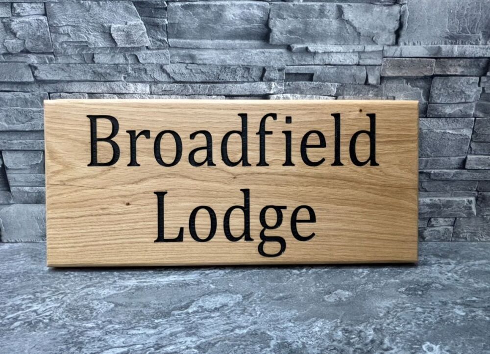 Wood House sign 2 lines