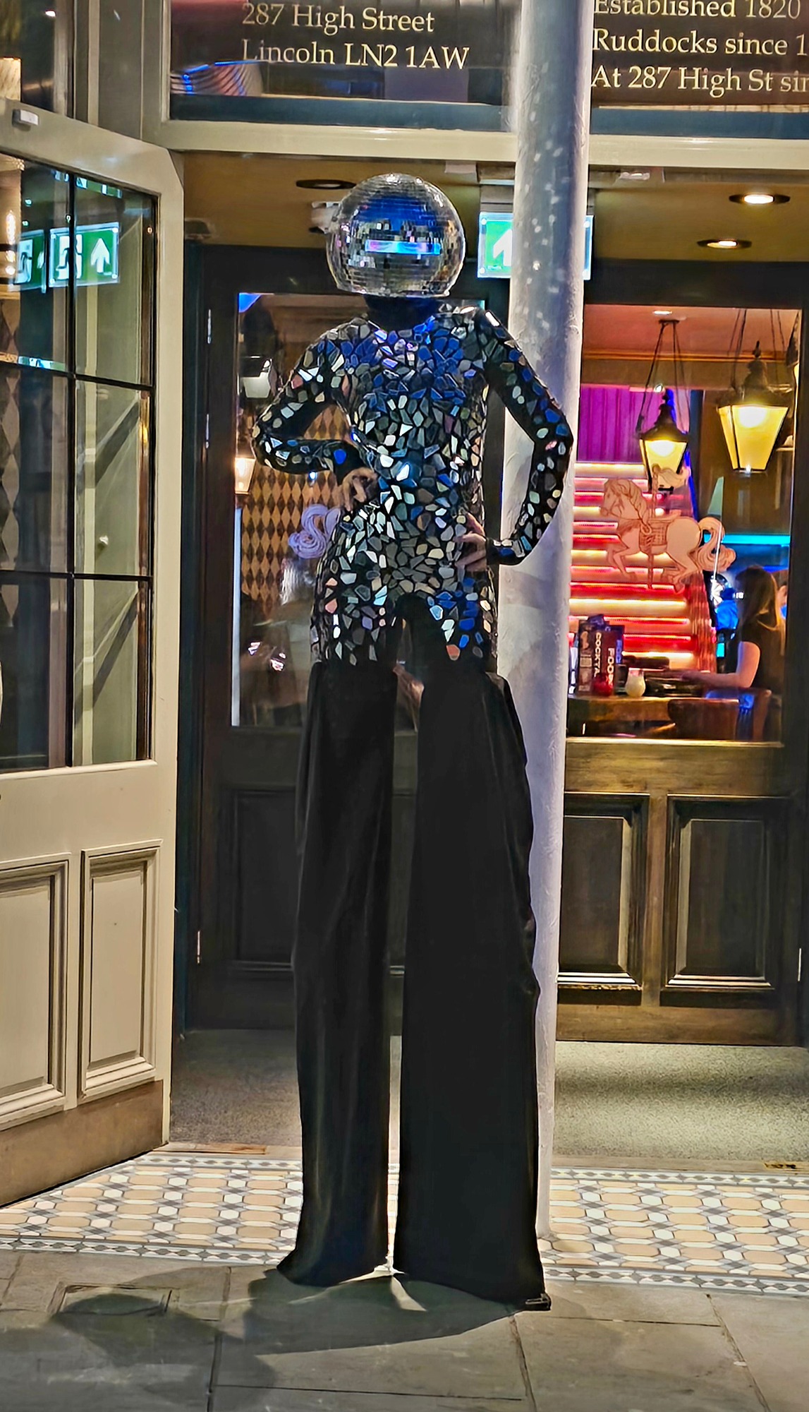 Disco ball stilt walker