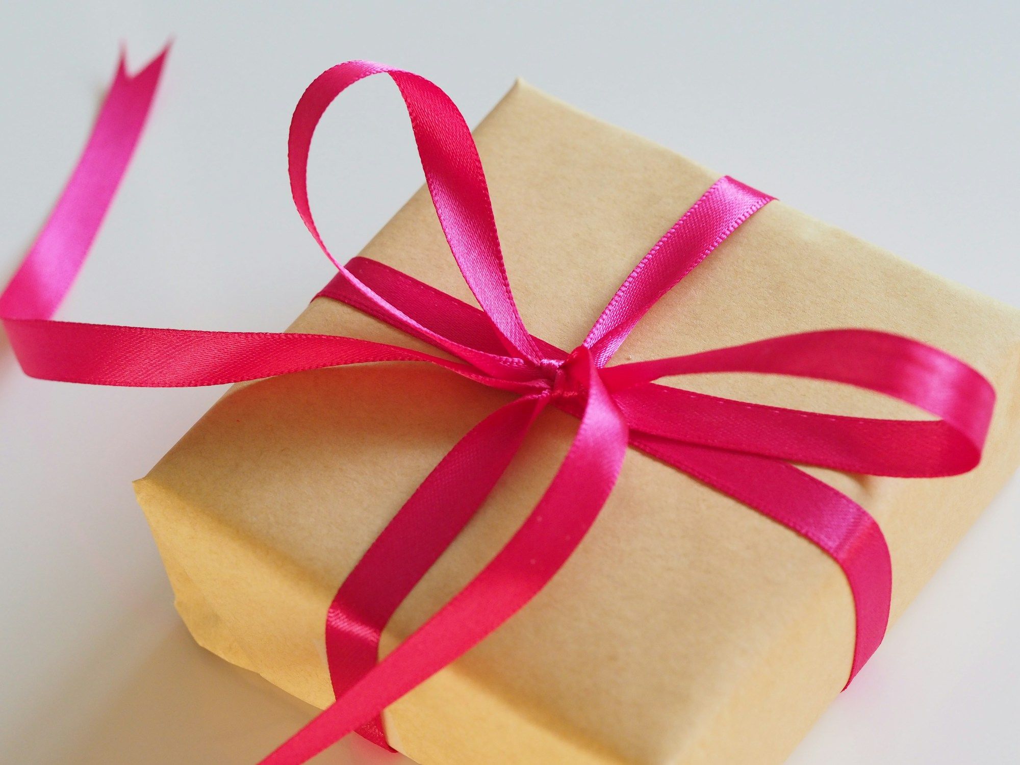 Wrapped parcel with ribbon