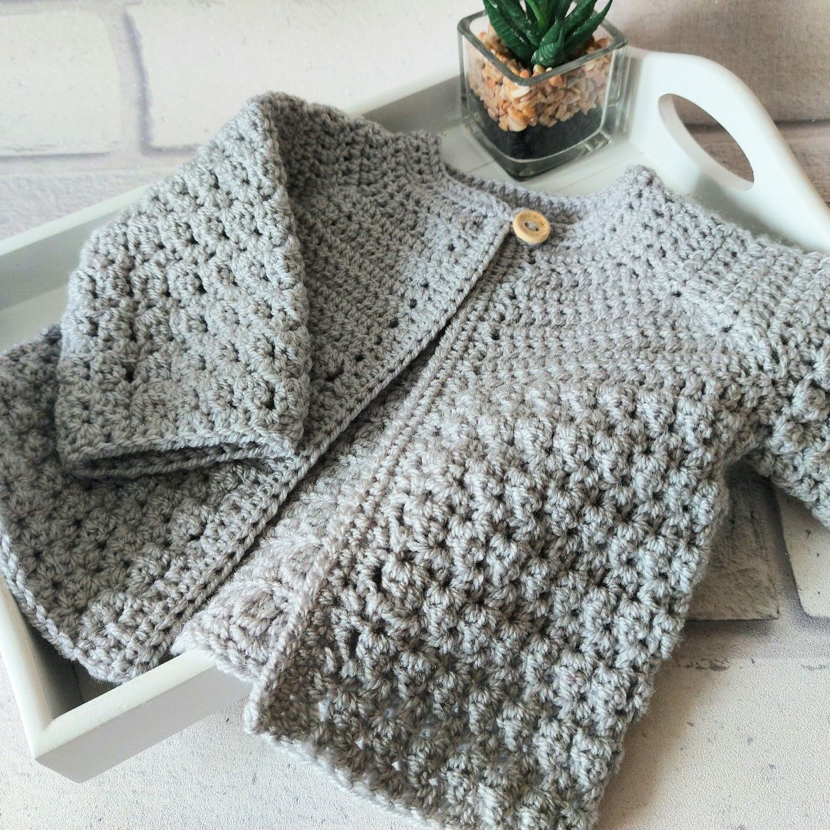 Silver handmade cardigan in sizes newborn up to 2 years